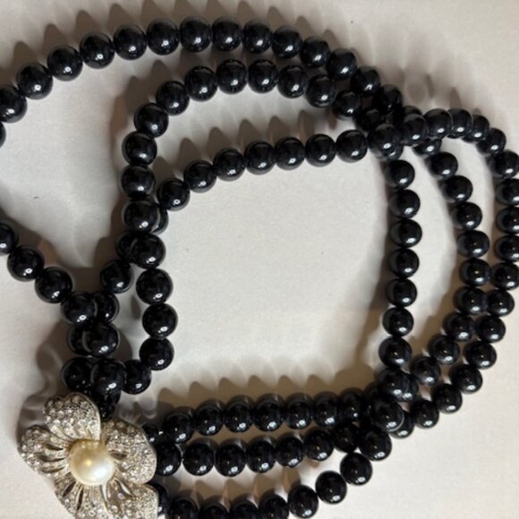 Elegant Designer Inspired Black Beaded Necklace with Floral Clasp - Picture 2 of 2